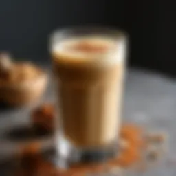 A close-up view of a glass filled with brown sugar oat milk shaken espresso, showcasing its rich texture and inviting color.