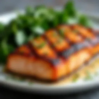 Plate of grilled salmon with a side of sautéed leafy greens