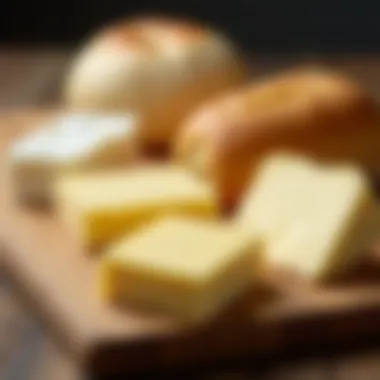 An assortment of cultured butter varieties on a wooden board