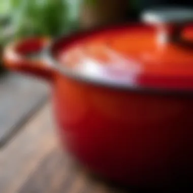 Close-up of the glossy surface of an enamel cast iron pot reflecting light beautifully.